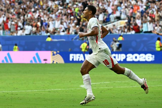 England's midfielder #10 Jude Bellingham celebrates scoring his team's sixth goal during the 2026 World Cup football tournament third-place match between France and England at the Miami Stadium in Miami on July 18, 2026.  (Photo by ROBERTO SCHMIDT / AFP)
