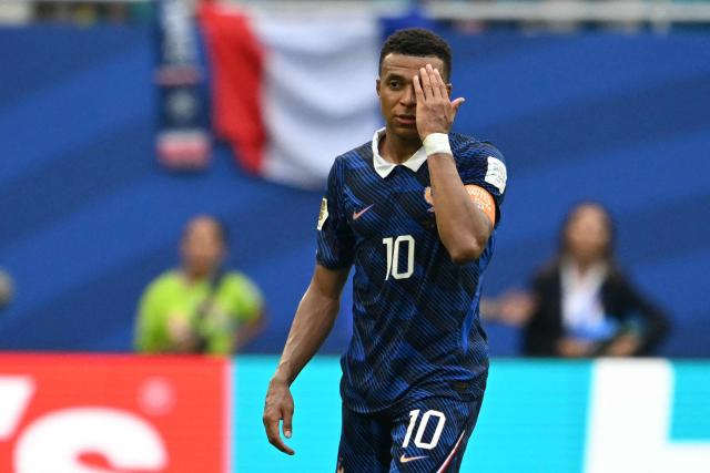 France's forward #10 Kylian Mbappe reacts after losing the 2026 World Cup football tournament third-place match between France and England at the Miami Stadium in Miami on July 18, 2026.  (Photo by ROBERTO SCHMIDT / AFP)