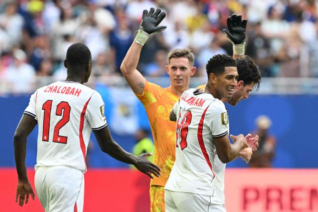 England's midfielder #10 Jude Bellingham and midfielder #04 Declan Rice celebrate after winning the 2026 World Cup football tournament third-place match between France and England at the Miami Stadium in Miami on July 18, 2026.  (Photo by ROBERTO SCHMIDT / AFP)