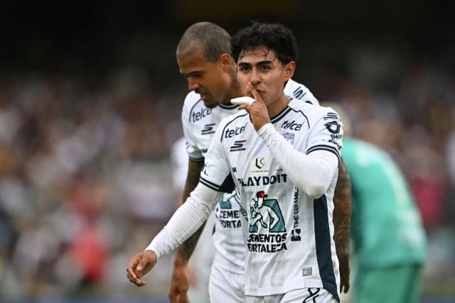Pachuca's midfielder #10 Elias Montiel celebrates after scoring during the Liga MX Apertura football match between Pumas and Pachuca at Olimpico Universitario stadium in Mexico City on July 18, 2026. (Photo by CARL DE SOUZA / AFP)