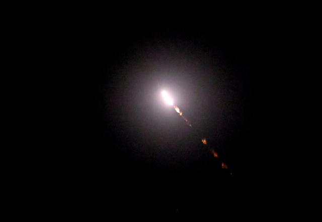 This photograph shows a flying missile during Russian missile strikes on the Ukrainian capital of Kyiv on July 19, 2026, amid the Russian invasion in Ukraine. Russian missiles rocked Ukraine's capital overnight, killing at least one person and wounding five others day after Kyiv launched a deadly wave of drones that pounded e-commerce warehouses in Russia. (Photo by Sergei SUPINSKY / AFP)