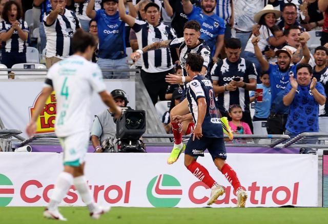 Monterrey's Argentine midfielder #07 Lucas Ocampos celebrates with Monterrey's Spanish midfielder #08 Oliver Torres after scoring during the Liga MX Apertura football match between Monterrey and Santos Laguna at BBVA stadium in Guadalupe, Nuevo Leon state, Mexico on July 18, 2026. (Photo by Julio Cesar AGUILAR / AFP)