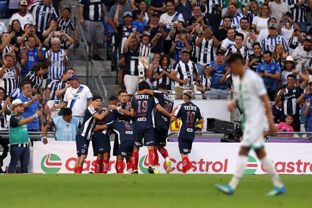 Monterrey's Argentine midfielder #07 Lucas Ocampos celebrates with teammates after scoring during the Liga MX Apertura football match between Monterrey and Santos Laguna at BBVA stadium in Guadalupe, Nuevo Leon state, Mexico on July 18, 2026. (Photo by Julio Cesar AGUILAR / AFP)