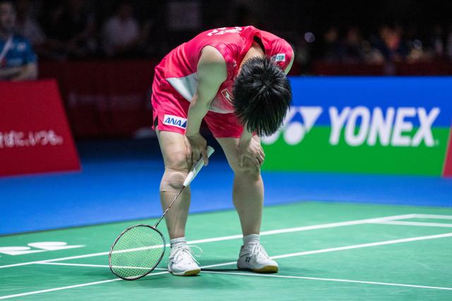 Japan’s Akane Yamaguchi reacts on a point against India’s Pusarla Venkata Sindhu in their women's singles final match of the Japan Open badminton tournament at Tokyo Gymnasium in Tokyo on July 19, 2026. (Photo by Yuichi YAMAZAKI / AFP)