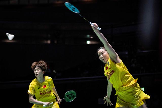 China’s Jia Yifan and Zhang Shuxian play a point against South Korea’s Kim Hye-jeong and Kong Hee-yong during the women's doubles final of the Japan Open badminton tournament at Tokyo Gymnasium in Tokyo on July 19, 2026. (Photo by Yuichi YAMAZAKI / AFP)