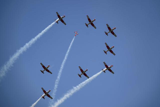 The Swiss Air Force PC-7 Team performs during an aerial show before the final match of the Swiss Open tennis tournament in Gstaad, on July 19, 2026. (Photo by Fabrice COFFRINI / AFP)