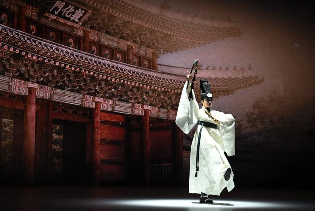 A South Korean dancer performs during the opening ceremony of the 48th session of the UNESCO World Heritage Committee at BEXCO convention and exhibition centre in Busan on July 19, 2026. (Photo by JUNG YEON-JE / POOL / AFP)