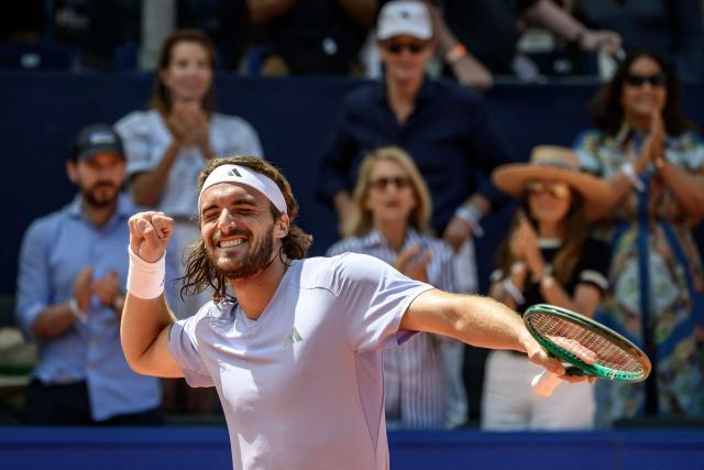 Greece's Stefanos Tsitsipas celebrates his victory against Belgium's Raphael Collignon during their men's singles final match at the Swiss Open tennis tournament in Gstaad, on July 19, 2026. (Photo by Fabrice COFFRINI / AFP)