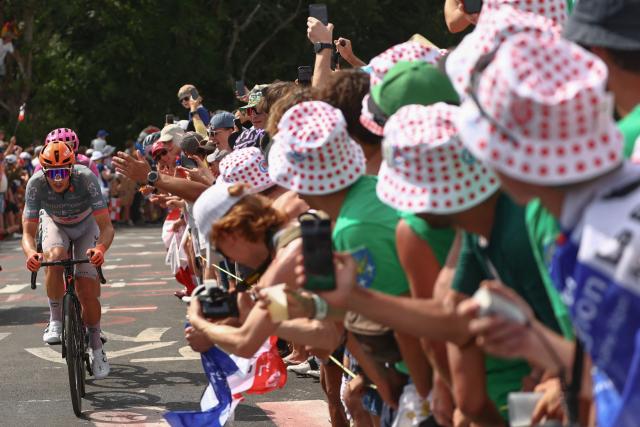 Netcompany INEOS team's French rider Kevin Vauquelin cycles in the ascent of the Col de la Croisette during the 15th stage of the 113th edition of the Tour de France cycling race, 183,9 km between Champagnole and Plateau de Solaison in the Jura mountains, on July 19, 2026. (Photo by Anne-Christine POUJOULAT / AFP)