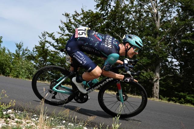 Bahrain - Victorious team's Australian rider Robert Stannard cycles in the desscent of the Col de la Croisette during the 15th stage of the 113th edition of the Tour de France cycling race, 183,9 km between Champagnole and Plateau de Solaison in the Jura mountains, on July 19, 2026. (Photo by Anne-Christine POUJOULAT / AFP)
