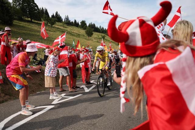 UAE Team Emirates - XRG's Slovenian rider Tadej Pogacar wearing the overall leader's yellow jersey cycles in the lead breakaway in the final ascent of the 15th stage of the 113th edition of the Tour de France cycling race, 183,9 km between Champagnole and Plateau de Solaison in the Jura mountains, on July 19, 2026. (Photo by Anne-Christine POUJOULAT / AFP)