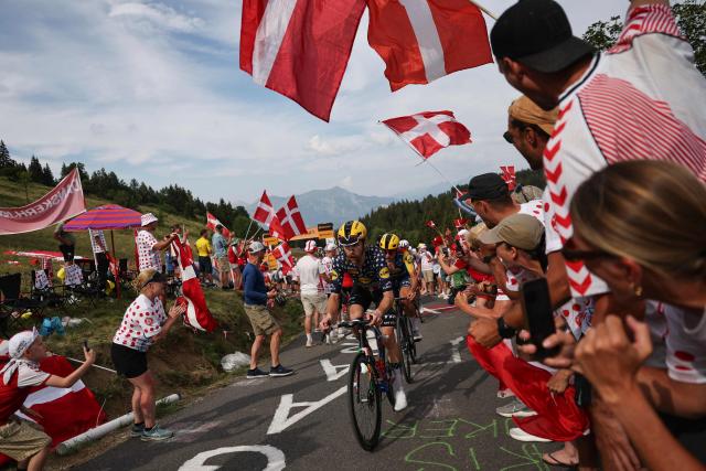 Lidl - Trek team's US rider Quinn Simmons cycles in the final ascent of the 15th stage of the 113th edition of the Tour de France cycling race, 183,9 km between Champagnole and Plateau de Solaison in the Jura mountains, on July 19, 2026. (Photo by Anne-Christine POUJOULAT / AFP)