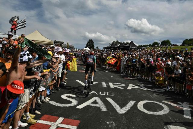 Decathlon CMA CGM Team's French rider Aurelien Paret-Peintre cycles in the final ascent of the 15th stage of the 113th edition of the Tour de France cycling race, 183,9 km between Champagnole and Plateau de Solaison in the Jura mountains, on July 19, 2026. (Photo by Jeff PACHOUD / AFP)