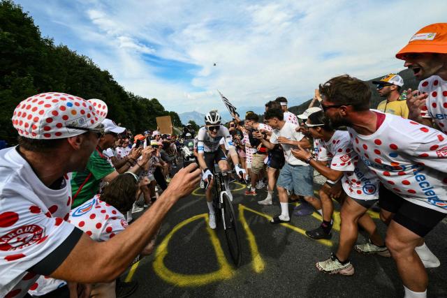 TOPSHOT - Decathlon CMA CGM Team's French rider Paul Seixas cycles in the final ascent of the 15th stage of the 113th edition of the Tour de France cycling race, 183,9 km between Champagnole and Plateau de Solaison in the Jura mountains, on July 19, 2026. (Photo by Jeff PACHOUD / AFP)