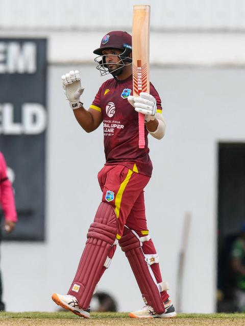 Amir Jangoo of West Indies celebrates his half century during the 4th One-Day International (ODI) cricket match between West Indies and New Zealand at Kensington Oval in Bridgetown, Barbados on July 19, 2026. (Photo by Randy Brooks / AFP)