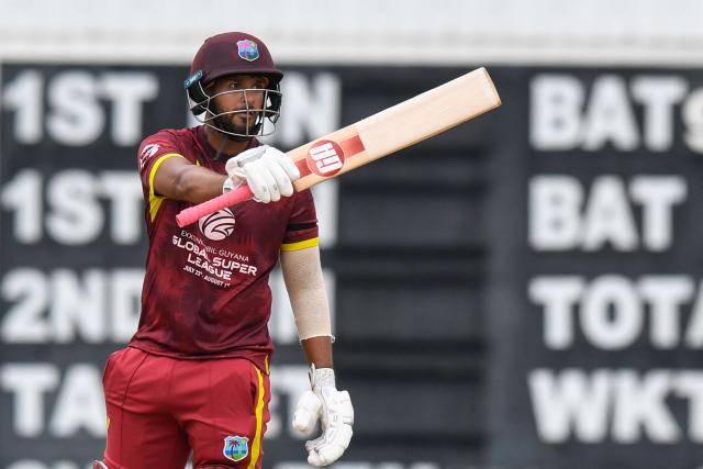 Amir Jangoo of West Indies celebrates his half century during the 4th One-Day International (ODI) cricket match between West Indies and New Zealand at Kensington Oval in Bridgetown, Barbados on July 19, 2026. (Photo by Randy Brooks / AFP)