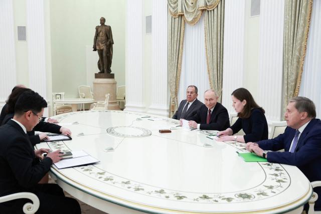 In this pool photograph distributed by the Russian state agency Sputnik, Russia's President Vladimir Putin (3rd R) attends a bilateral meeting with North Korean Foreign Minister in Moscow on July 19, 2026. (Photo by Alexander SHCHERBAK / POOL / AFP)