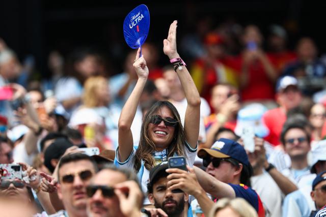 An Argentine fan cheers for her team ahead of the 2026 World Cup football tournament final match between Spain and Argentina at the New York/New Jersey Stadium in East Rutherford on July 19, 2026.  (Photo by FRANCK FIFE / AFP)