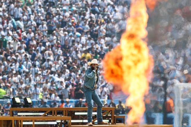 US singer and rapper Post Malone performs during the closing ceremony of the 2026 World Cup football tournament final match between Spain and Argentina at the New York/New Jersey Stadium in East Rutherford on July 19, 2026.  (Photo by FRANCK FIFE / AFP)