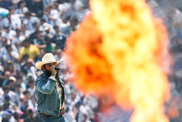 US singer and rapper Post Malone performs during the closing ceremony of the 2026 World Cup football tournament final match between Spain and Argentina at the New York/New Jersey Stadium in East Rutherford on July 19, 2026.  (Photo by FRANCK FIFE / AFP)