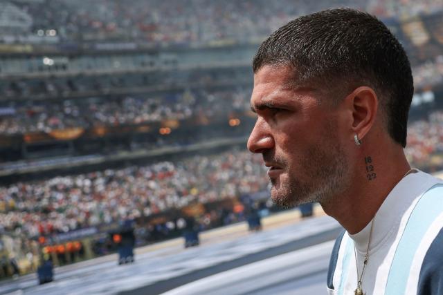 Argentina's midfielder #07 Rodrigo De Paul inspects the pitch ahead of the 2026 World Cup football tournament final match between Spain and Argentina at the New York/New Jersey Stadium in East Rutherford on July 19, 2026.  (Photo by PATRICIA DE MELO MOREIRA / AFP)