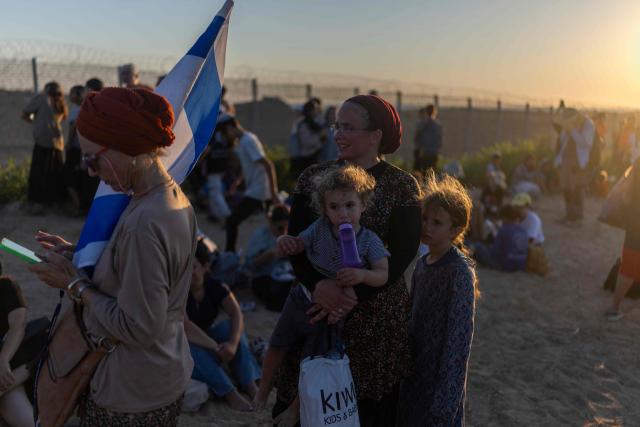 Israeli right-wing activists gather on the border with the Gaza Strip as they attempt to cross over into the embattled territory on July 19, 2026. A ceasefire remains in place between Israel and Palestinian militant group Hamas, but it has not halted violence in Gaza, and efforts to secure a lasting agreement to end the war have stalled (Photo by ilia YEFIMOVICH / AFP)