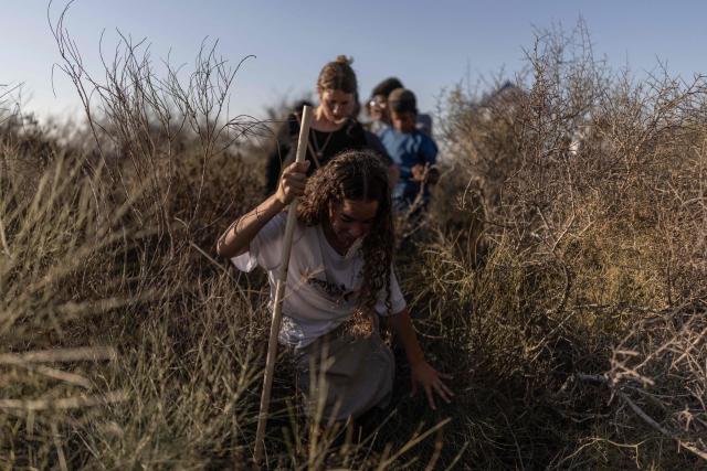 Israeli right-wing activists gather on the border with the Gaza Strip as they attempt to cross over into the embattled territory on July 19, 2026. A ceasefire remains in place between Israel and Palestinian militant group Hamas, but it has not halted violence in Gaza, and efforts to secure a lasting agreement to end the war have stalled (Photo by ilia YEFIMOVICH / AFP)