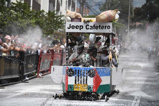 Soapbox cart riders race downhill during the 2026 Cerro Quitasol Festival in Bello, Antioquia Department, Colombia, on July 19, 2026. (Photo by Jaime SALDARRIAGA / AFP)