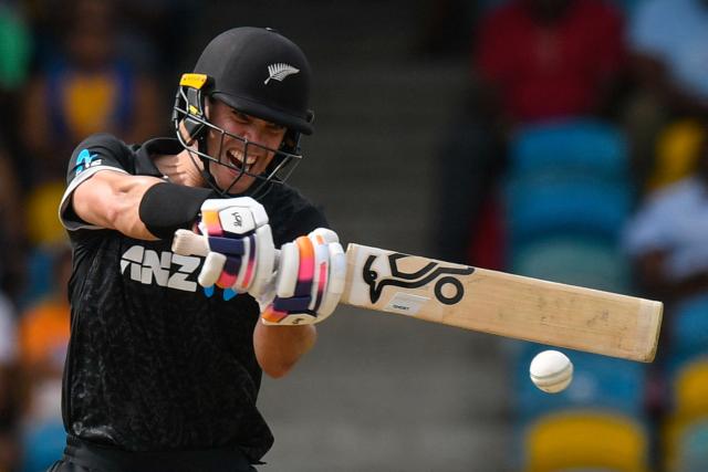 Mark Chapman of New Zealand hits 4 during the 4th One-Day International (ODI) cricket match between West Indies and New Zealand at Kensington Oval in Bridgetown, Barbados on July 19, 2026. (Photo by Randy Brooks / AFP)