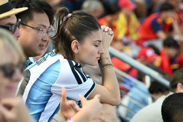 An Argentina fan reacts during the 2026 World Cup football tournament final match between Spain and Argentina at the New York/New Jersey Stadium in East Rutherford on July 19, 2026.  (Photo by ROBERTO SCHMIDT / AFP)