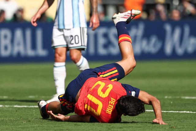 Spain's midfielder #20 Pedri falls during the 2026 World Cup football tournament final match between Spain and Argentina at the New York/New Jersey Stadium in East Rutherford on July 19, 2026.  (Photo by FRANCK FIFE / AFP)