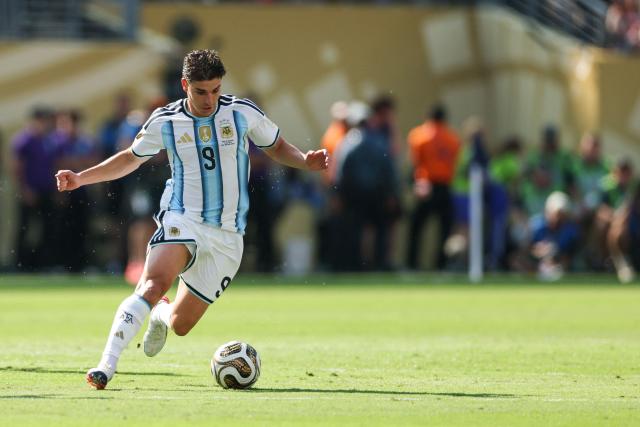 Argentina's forward #09 Julian Alvarez runs with the ball during the 2026 World Cup football tournament final match between Spain and Argentina at the New York/New Jersey Stadium in East Rutherford on July 19, 2026.  (Photo by PATRICIA DE MELO MOREIRA / AFP)