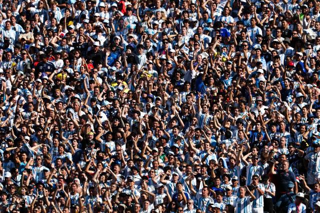 Argentine fans cheer for their team during the 2026 World Cup football tournament final match between Spain and Argentina at the New York/New Jersey Stadium in East Rutherford on July 19, 2026.  (Photo by FRANCK FIFE / AFP)