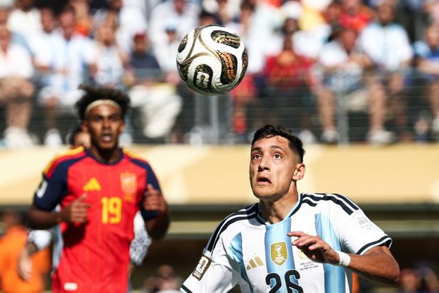 Argentina's defender #26 Nahuel Molina looks at the ball during the 2026 World Cup football tournament final match between Spain and Argentina at the New York/New Jersey Stadium in East Rutherford on July 19, 2026.  (Photo by FRANCK FIFE / AFP)