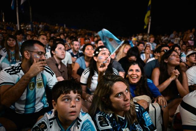 Argentina's fans watch the FIFA World Cup final match between Spain and Argentina at Copacabana beach in Rio de Janeiro, Brazil, on July 19, 2026. (Photo by Pablo PORCIUNCULA / AFP)