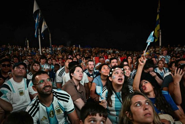 Argentina's fans watch the FIFA World Cup final match between Spain and Argentina at Copacabana beach in Rio de Janeiro, Brazil, on July 19, 2026. (Photo by Pablo PORCIUNCULA / AFP)