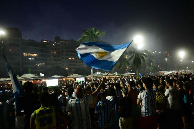 Argentina's fans watch the FIFA World Cup final match between Spain and Argentina at Copacabana beach in Rio de Janeiro, Brazil, on July 19, 2026. (Photo by Pablo PORCIUNCULA / AFP)