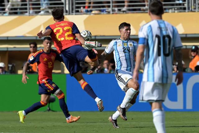 Spain's defender #22 Pau Cubarsi (2ndL) is fouled by Argentina's midfielder #24 Enzo Fernandez during the 2026 World Cup football tournament final match between Spain and Argentina at the New York/New Jersey Stadium in East Rutherford on July 19, 2026.  (Photo by JUAN MABROMATA / AFP)