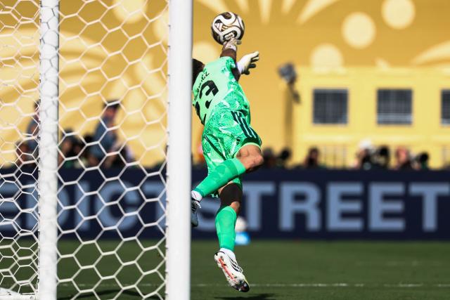 Argentina's goalkeeper #23 Emiliano Martinez makes a save after a shot by Spain's forward #19 Lamine Yamal (unseen) during the 2026 World Cup football tournament final match between Spain and Argentina at the New York/New Jersey Stadium in East Rutherford on July 19, 2026.  (Photo by FRANCK FIFE / AFP)