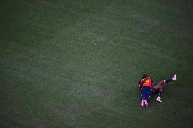 Spain's forward #17 Nico Williams AND Spain's forward #19 Lamine Yamal celebrate after Spain won the 2026 World Cup football tournament final match between Spain and Argentina at the New York/New Jersey Stadium in East Rutherford on July 19, 2026.  (Photo by MAURO PIMENTEL / AFP)