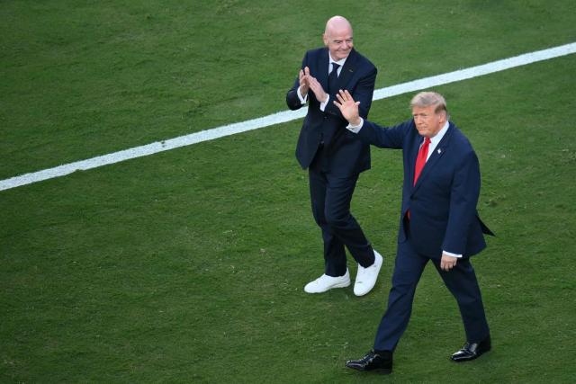 FIFA President Gianni Infantino (L) and US President Donald Trump arrive for the final ceremony after the 2026 World Cup football tournament final match between Spain and Argentina at the New York/New Jersey Stadium in East Rutherford on July 19, 2026.  (Photo by ANGELA WEISS / AFP)