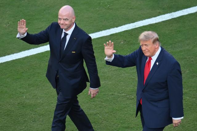 FIFA President Gianni Infantino (L) and US President Donald Trump arrive for the final ceremony after the 2026 World Cup football tournament final match between Spain and Argentina at the New York/New Jersey Stadium in East Rutherford on July 19, 2026.  (Photo by ANGELA WEISS / AFP)