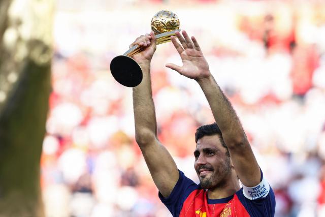 Spain's midfielder #16 Rodri receives the Golden Ball Award during the award ceremony of the 2026 World Cup football tournament final match between Spain and Argentina at the New York/New Jersey Stadium in East Rutherford on July 19, 2026.  (Photo by FRANCK FIFE / AFP)