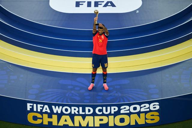 Spain's midfielder #16 Rodri celebrates with the Golden Ball trophy after the 2026 World Cup football tournament final match between Spain and Argentina at the New York/New Jersey Stadium in East Rutherford on July 19, 2026.  (Photo by ANGELA WEISS / AFP)