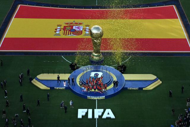Spain's midfielder #16 Rodri lifts the trophy with his teammates after Spain won the 2026 World Cup football tournament final match between Spain and Argentina at the New York/New Jersey Stadium in East Rutherford on July 19, 2026.  (Photo by MAURO PIMENTEL / AFP)