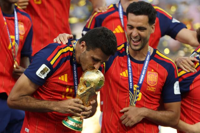 TOPSHOT - Spain's midfielder #16 Rodri kisses the trophy after winning the 2026 World Cup football tournament final match between Spain and Argentina at the New York/New Jersey Stadium in East Rutherford on July 19, 2026.  (Photo by Odd ANDERSEN / AFP)