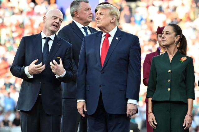 FIFA President Gianni Infantino (L) speaks with US President Donald Trump as Mexico’s President Claudia Sheinbaum looks on during the presentation ceremony of the 2026 World Cup football tournament final match between Spain and Argentina at the New York/New Jersey Stadium in East Rutherford on July 19, 2026.  (Photo by Mandel NGAN / AFP)