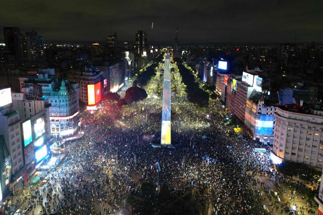 This aerial view shows Argentina's fans gathering at the Obelisk after Argentina lost the FIFA World Cup final football match against Spain in Buenos Aires on July 19, 2026. Spain won by 1-0. (Photo by Luis ROBAYO / AFP)