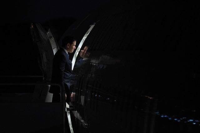 US Secretary of State Marco Rubio boards his plane before departing from Joint Base Andrews in Maryland on July 19, 2026. Secretary Rubio is traveling to Manila, Philippines to attend the 59th ASEAN Foreign Ministers' Meeting and related meetings. (Photo by Brendan Smialowski / POOL / AFP)