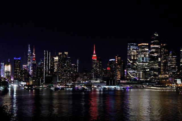 The Empire State Building is lit up in the colors of the Spanish flag after Spain won the 2026 World Cup Final football match against Argentina, in New York on July 19, 2026. (Photo by Leonardo Munoz / AFP)